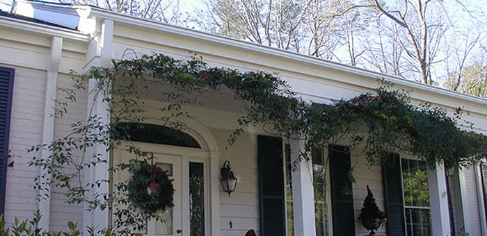 LeafGuard gutters shown on a ranch house