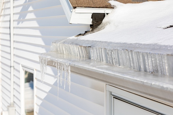 Snow and ice in gutter